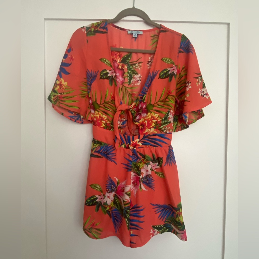 Pink tropical romper with tie front. Size S